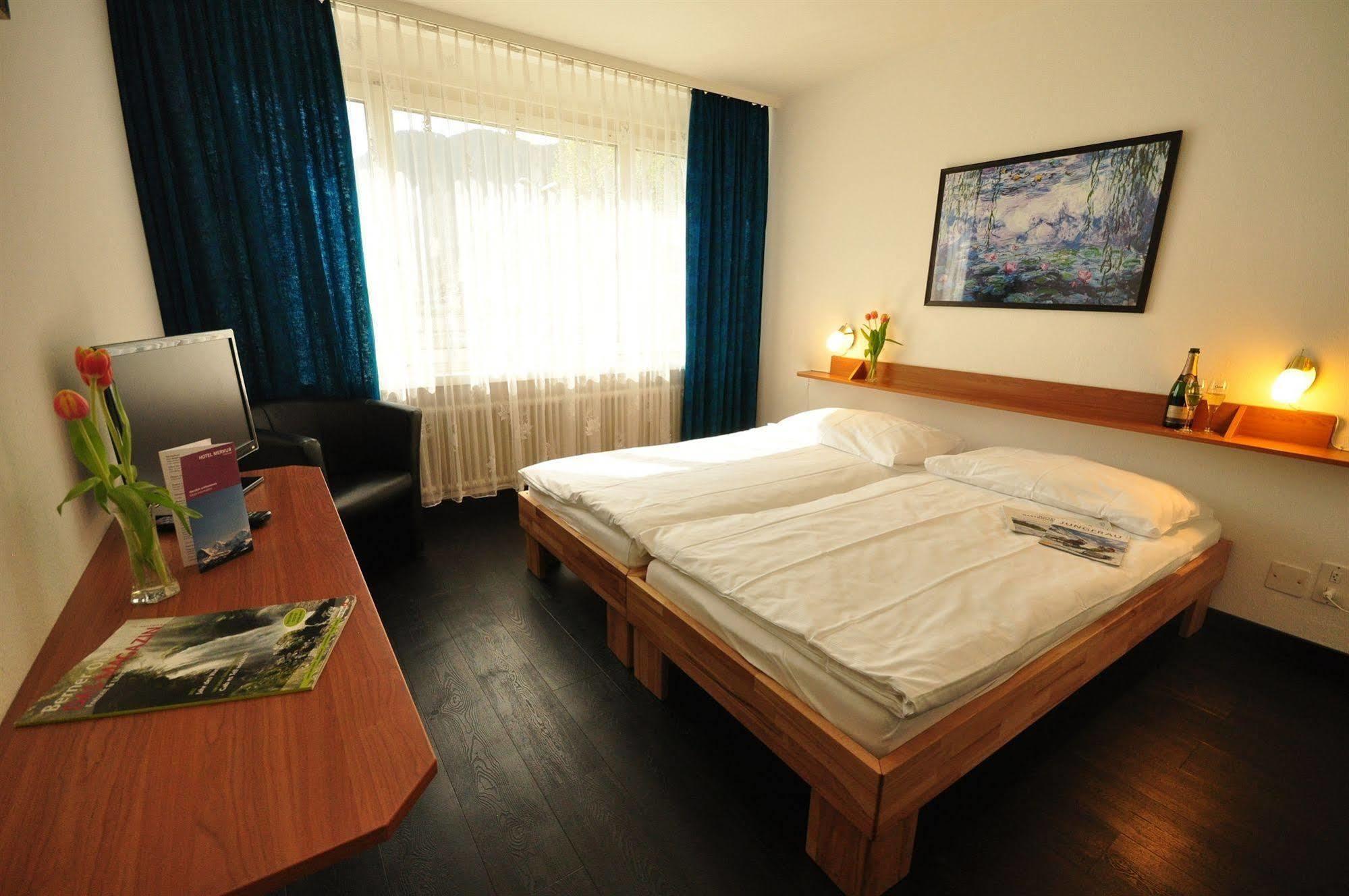 Hotel Merkur - West Station Interlaken Kültér fotó